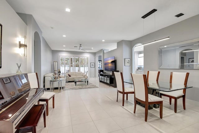 dining room with ceiling fan and light tile patterned floors