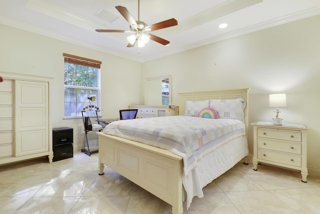 bedroom featuring ceiling fan, crown molding, and a tray ceiling