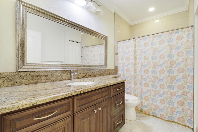 bathroom featuring tile patterned flooring, vanity, toilet, and ornamental molding