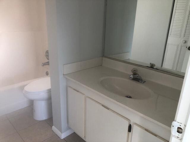 full bathroom with tile patterned floors, vanity, toilet, and shower / bathing tub combination