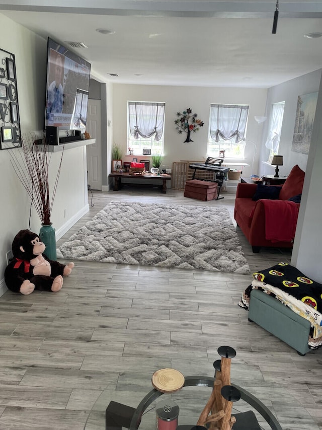 living room with plenty of natural light