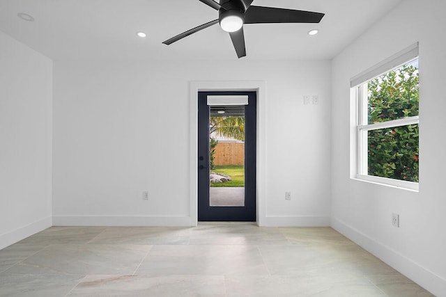 foyer with ceiling fan