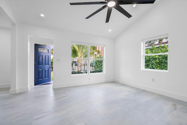 interior space with high vaulted ceiling and ceiling fan