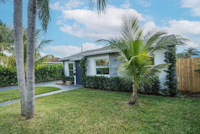 view of front of house with a front yard