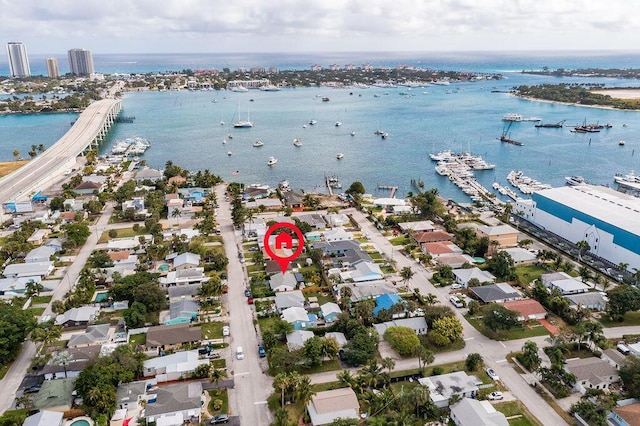 birds eye view of property featuring a water view