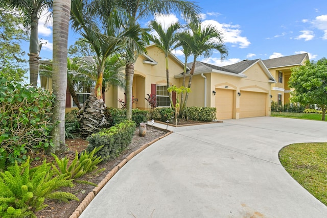 view of front of property featuring a garage