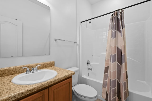 full bathroom with vanity, toilet, and shower / bath combo with shower curtain