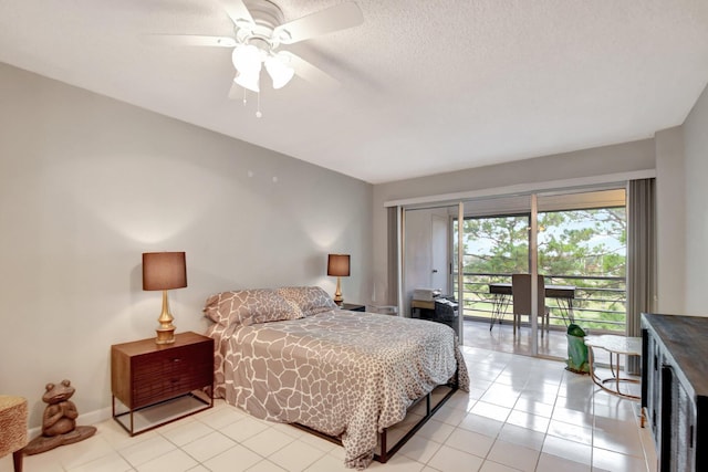 tiled bedroom with access to exterior, ceiling fan, and a textured ceiling