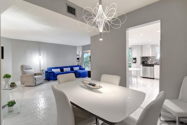 dining area with a chandelier