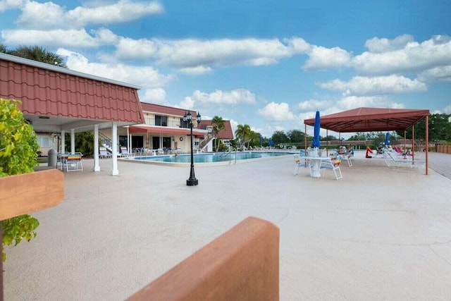 view of pool with a patio