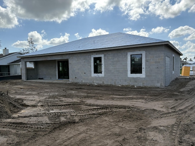 rear view of house featuring a patio