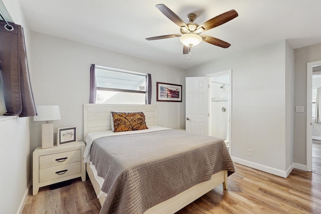 bedroom featuring ensuite bath, ceiling fan, and light hardwood / wood-style floors