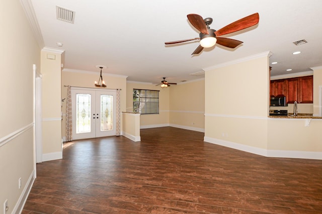 unfurnished living room featuring french doors, dark hardwood / wood-style flooring, ornamental molding, ceiling fan, and sink