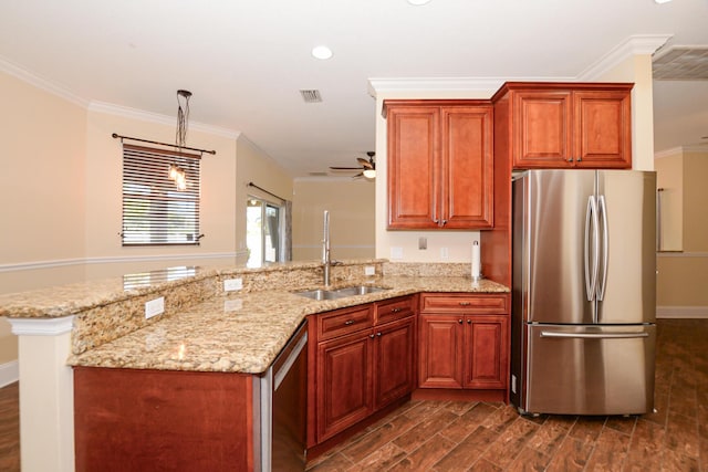 kitchen featuring kitchen peninsula, ceiling fan, sink, and appliances with stainless steel finishes