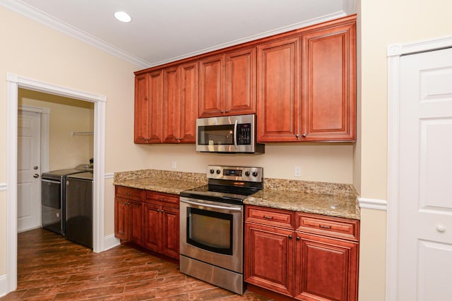 kitchen featuring washer and clothes dryer, crown molding, light stone countertops, appliances with stainless steel finishes, and dark hardwood / wood-style flooring