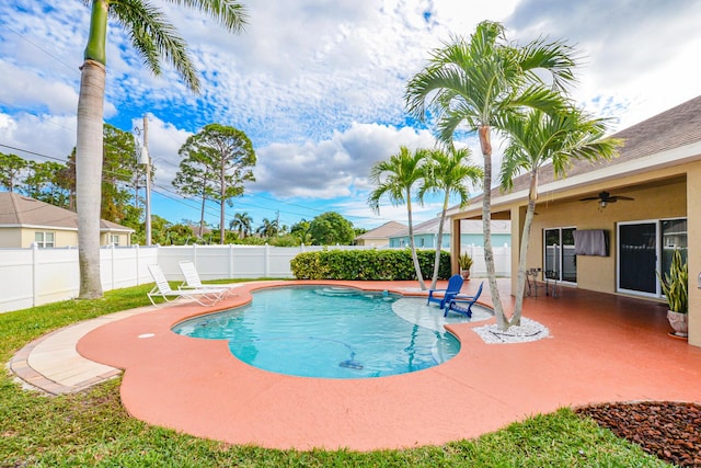 view of pool featuring ceiling fan and a patio