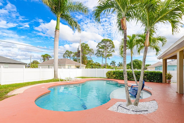 view of swimming pool featuring a patio