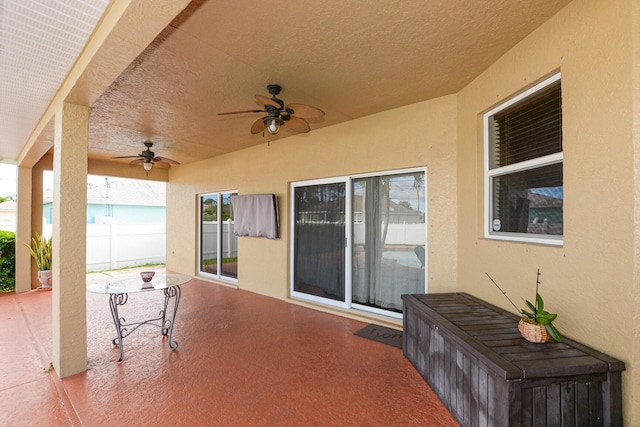 view of patio / terrace featuring ceiling fan