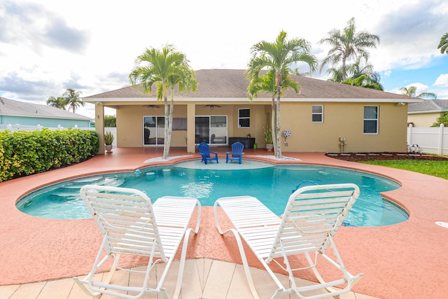 view of pool featuring ceiling fan and a patio area