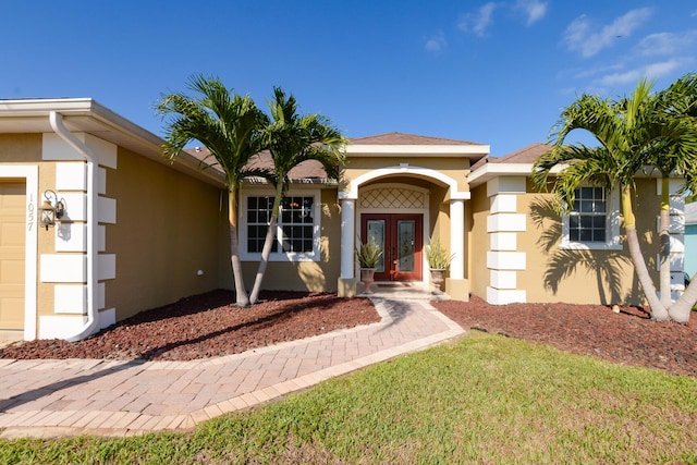 view of exterior entry with french doors