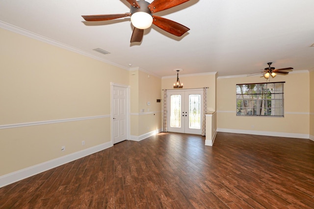 unfurnished living room featuring french doors, ceiling fan with notable chandelier, dark wood-type flooring, and crown molding