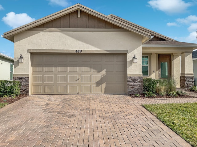 view of front of property featuring a garage