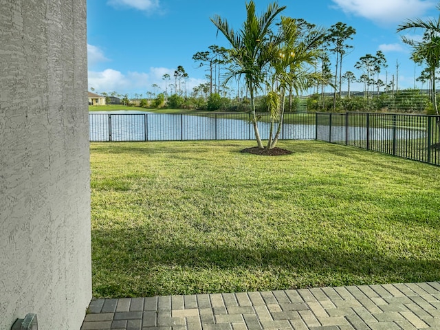 view of yard with a water view