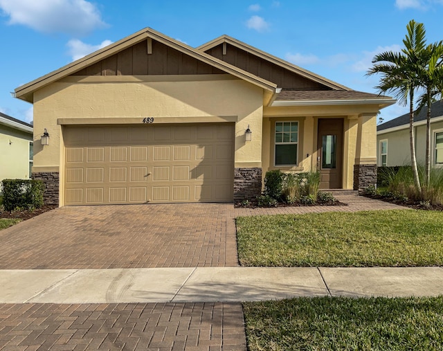 craftsman house with a garage