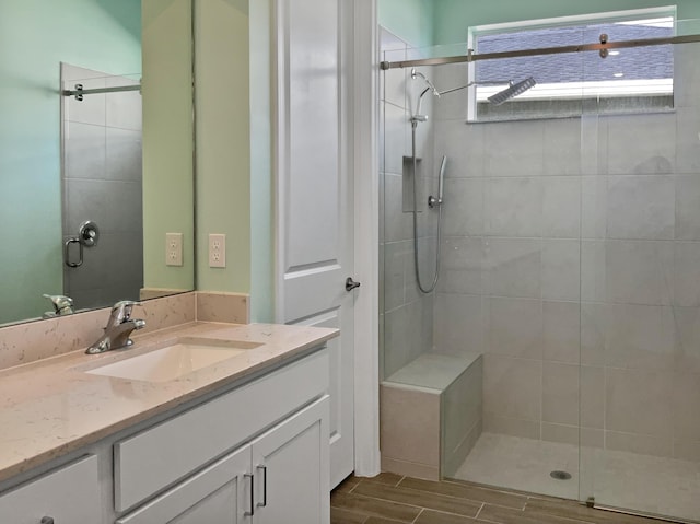 bathroom with vanity and an enclosed shower