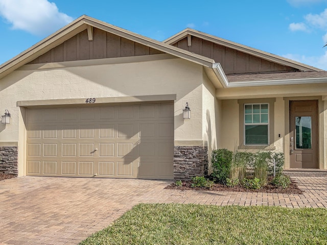 view of front of home with a garage