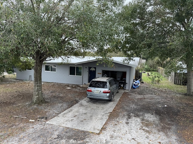 ranch-style home with a garage