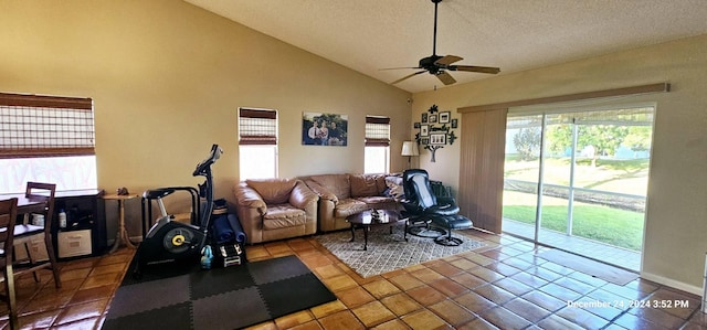 living room featuring a textured ceiling, tile patterned floors, ceiling fan, and lofted ceiling