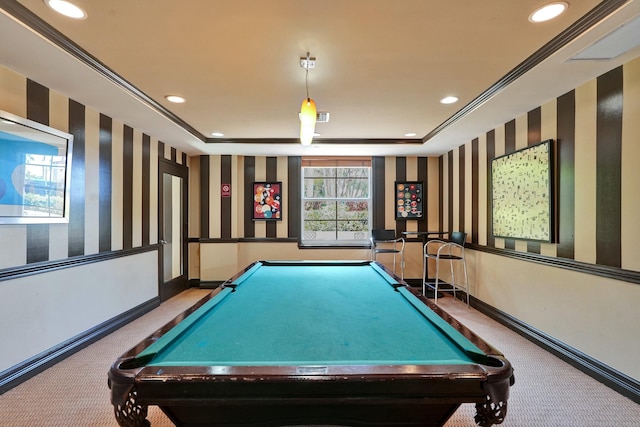 rec room with a tray ceiling, ornamental molding, and billiards