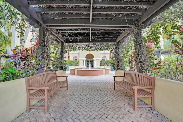 view of patio featuring a pergola