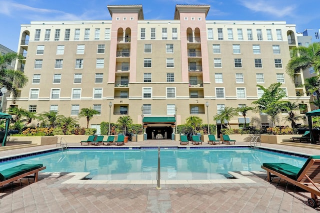 view of swimming pool with a patio