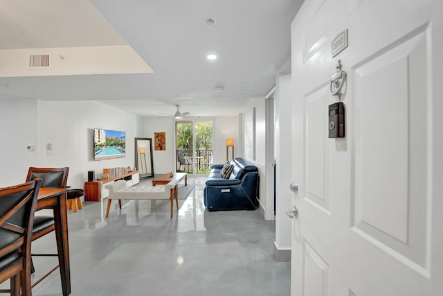 living room featuring ceiling fan