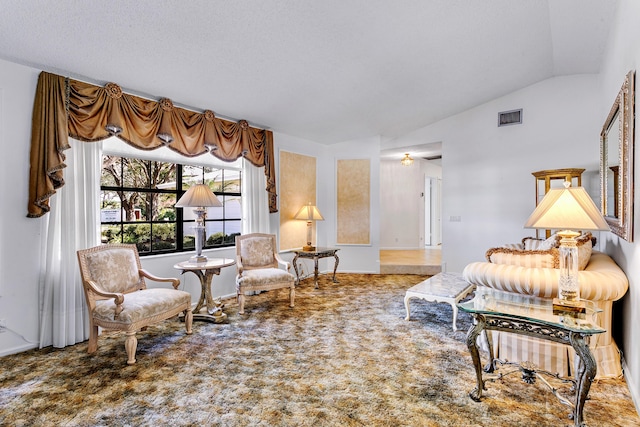 bedroom featuring vaulted ceiling and carpet