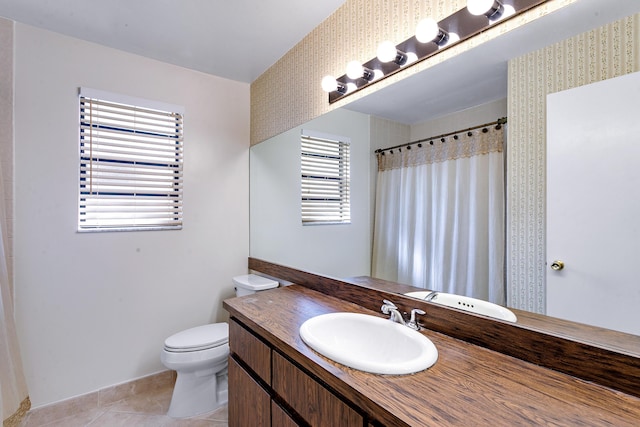 bathroom with tile patterned flooring, vanity, toilet, and a shower with shower curtain