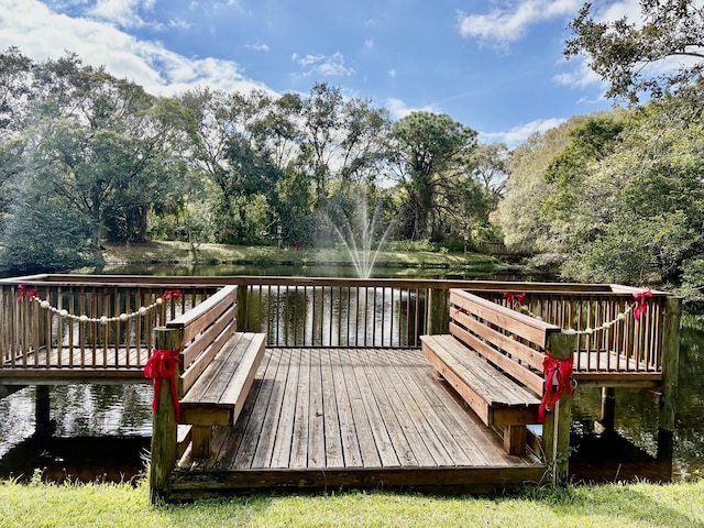 deck featuring a water view