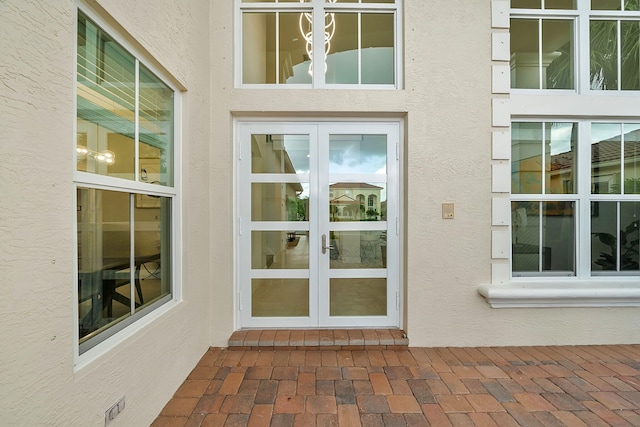 doorway to property featuring french doors