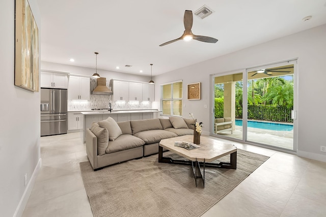 living room featuring ceiling fan