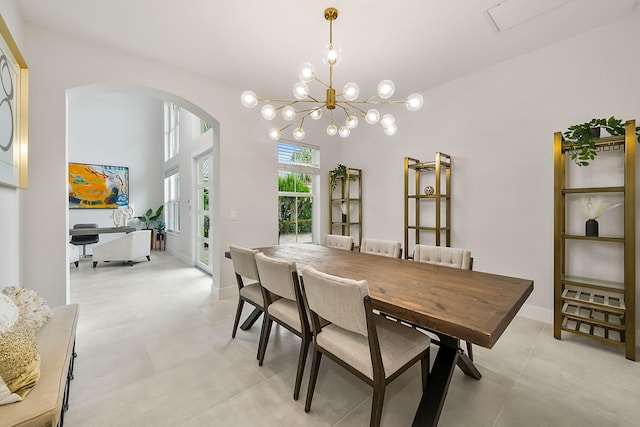 dining space with a notable chandelier