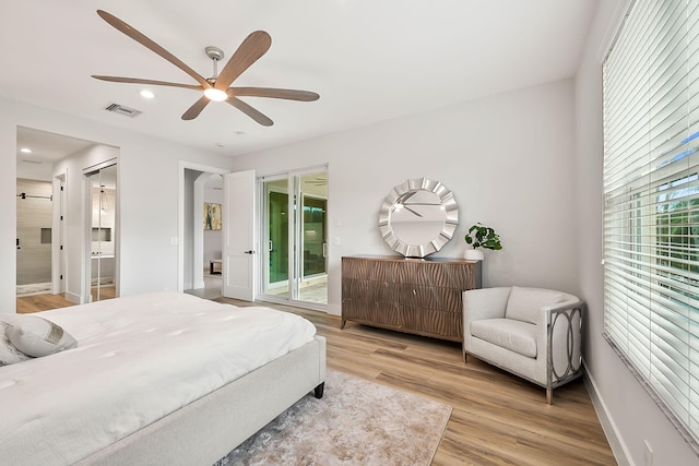 bedroom with access to outside, connected bathroom, ceiling fan, and light wood-type flooring