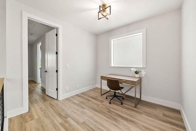 office space with light hardwood / wood-style flooring