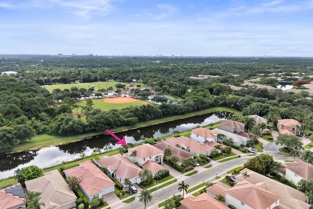 birds eye view of property featuring a water view