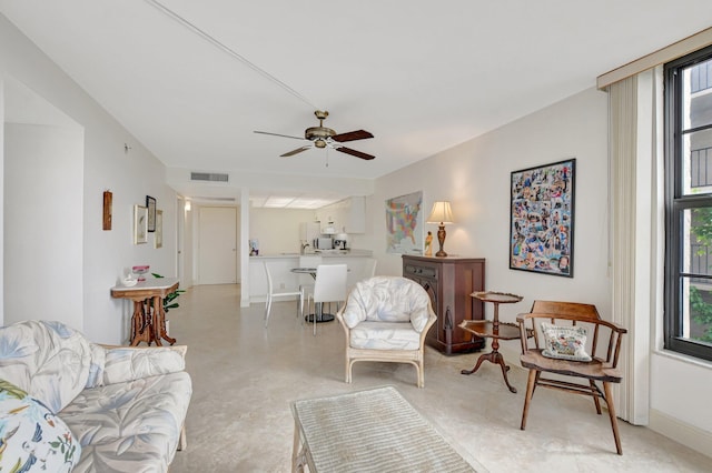 living room with ceiling fan