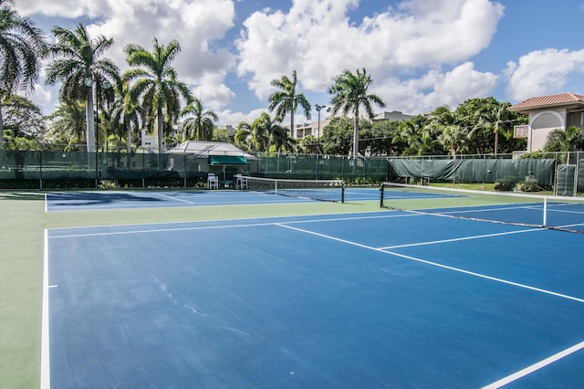 view of sport court featuring basketball hoop