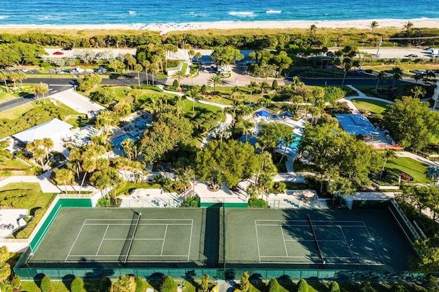 aerial view featuring a water view and a beach view