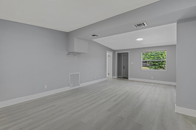 unfurnished room featuring light wood-type flooring