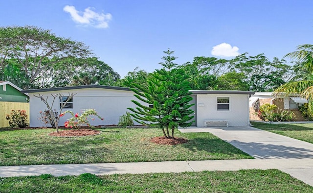 view of front of home with a front lawn